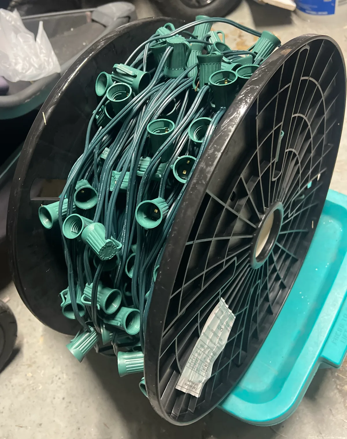 A spool of professional-grade green-wire C9 light line ready to install