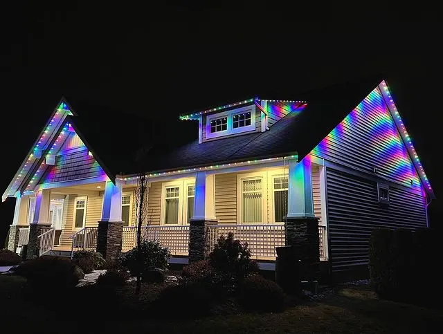 Craftsman bungalow outlined in rainbow RGBW color, porch peaks traced