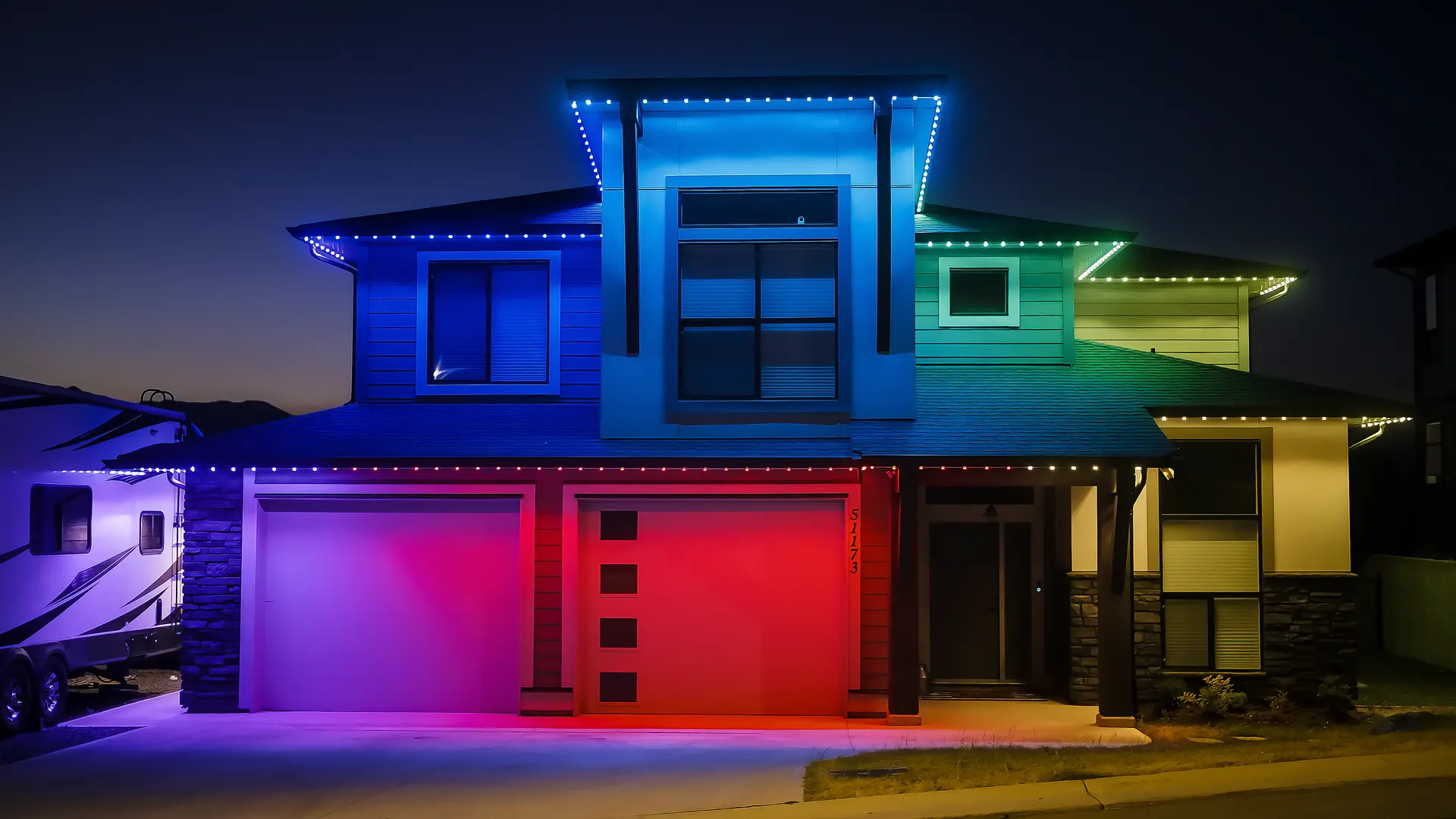 Modern home outlined in blue green red multicolor zones, clean crisp dusk shot
